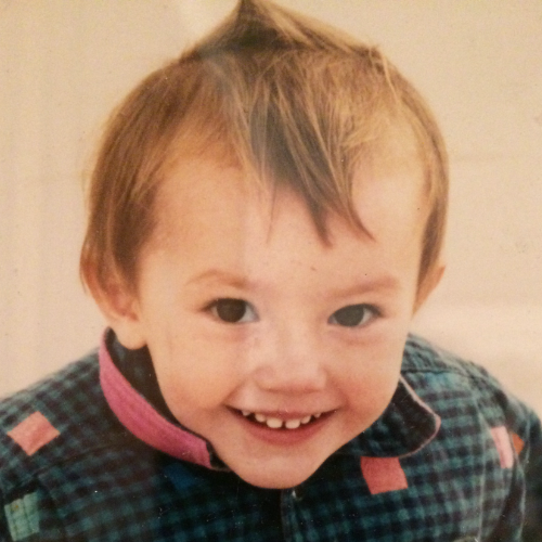 This is a circular image of Caoimhe as a young child.